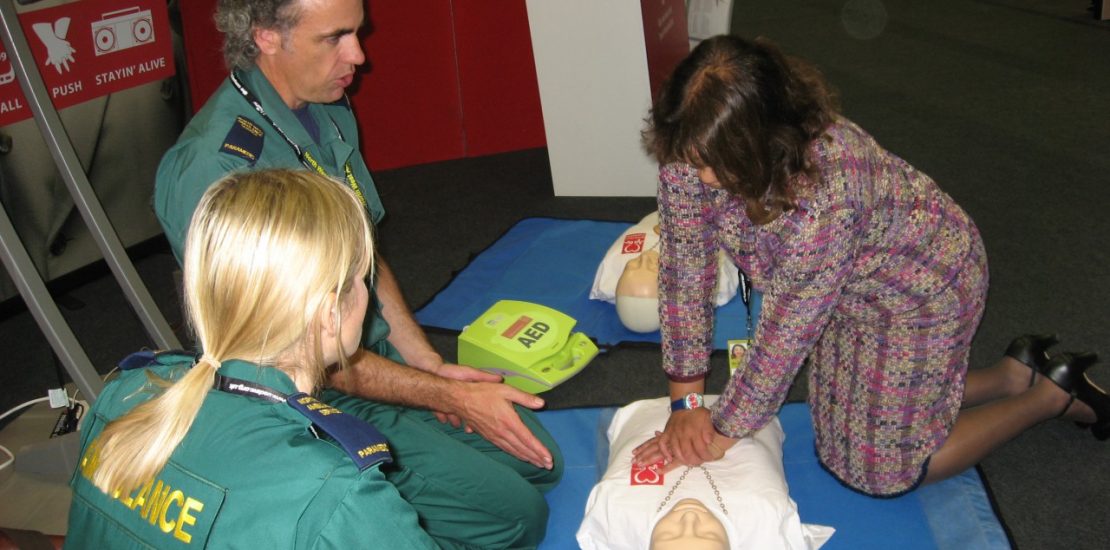 Valerie practicing Hands-only CPR