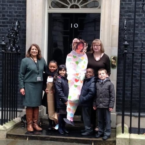 valerie-with-blue-coat-school-children